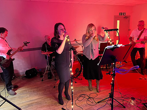 The Sunset band performing